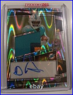 De'Von Achane Patch Auto 15/70 Spectra Supernova Silver Prizm 4-Color Jersey RPA